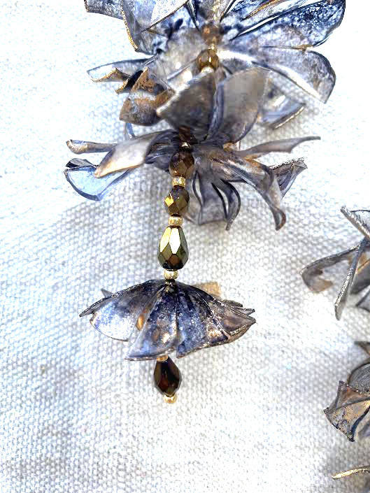 Black + gold aster floral statement earring.